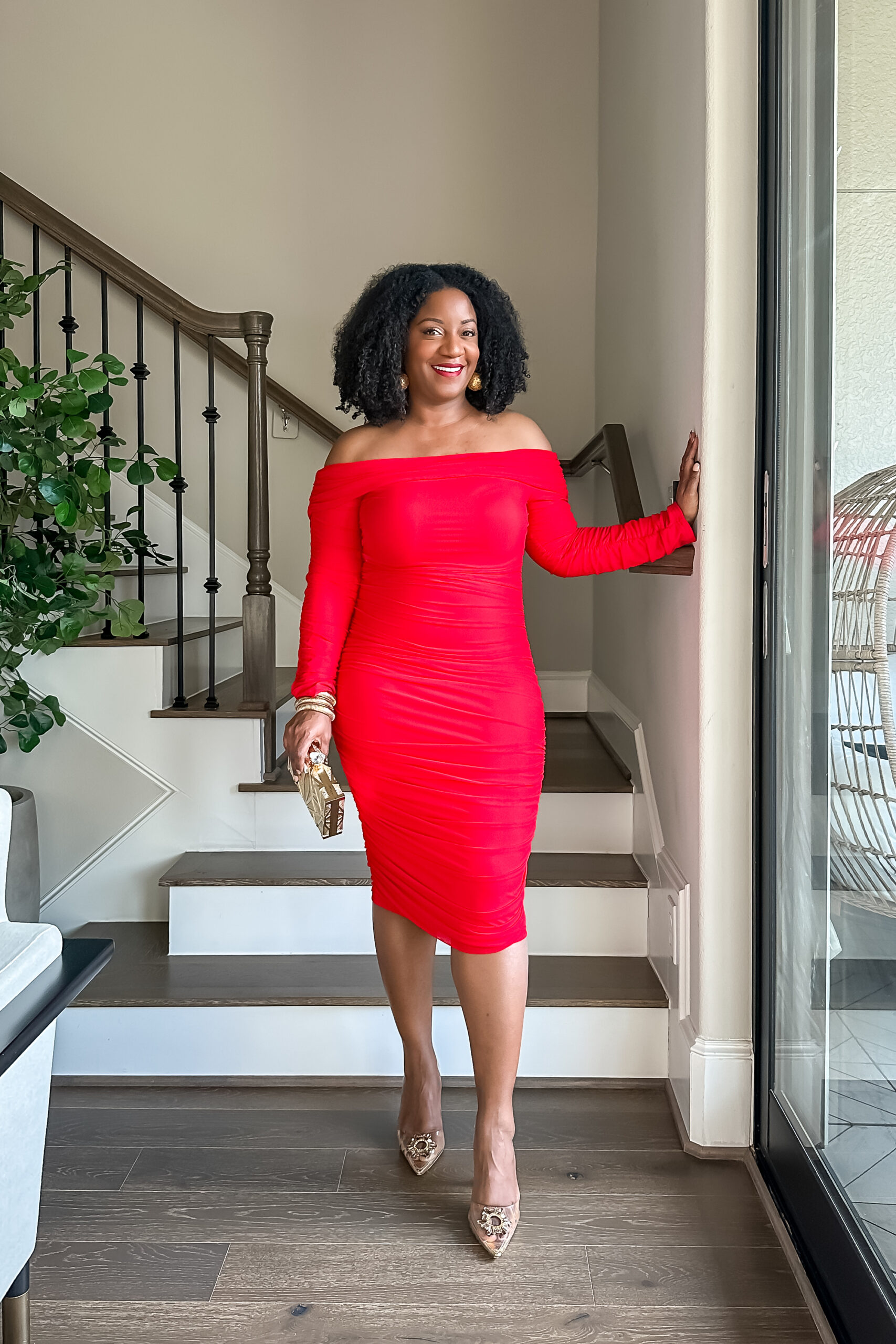 Red off shoulder ruched midi dress styled with the Honeylove SuperPower Short underneath for smoothing and shaping